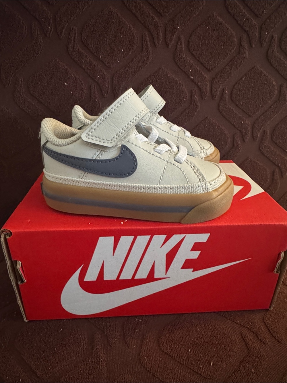 Nike Kids White Sneakers with Navy Swoosh and Gum Sole